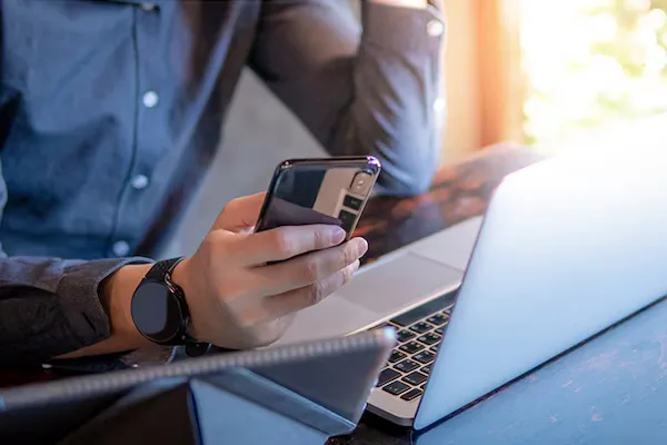 GAF - person holding cell phone